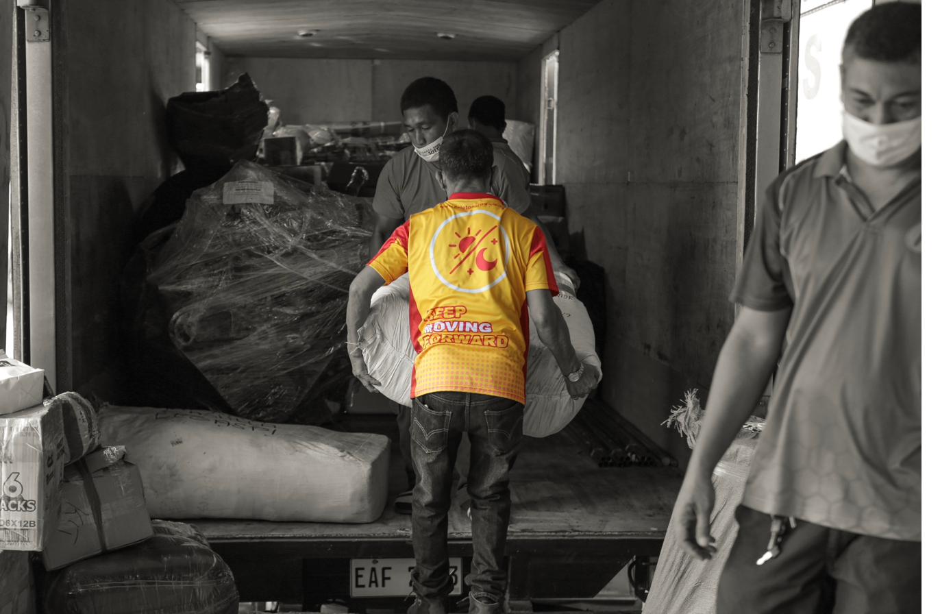 PCF worker loading cargo